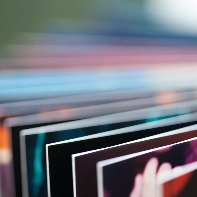 Close-up of printed media samples from Ricoh