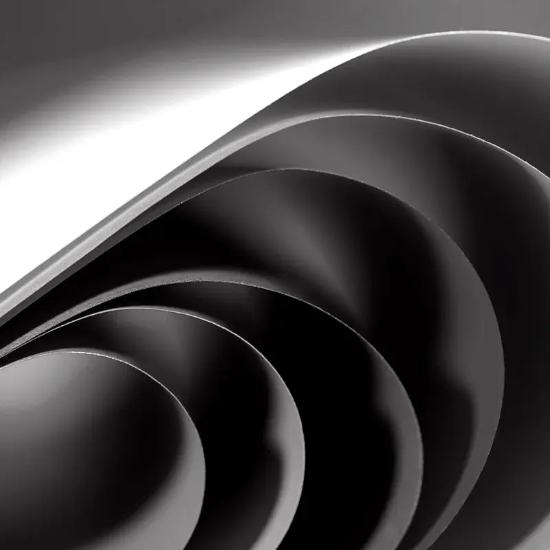 Curving black paper sheets