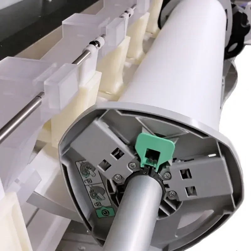 IM CW2200 roll-holder and media-feed mechanism close-up