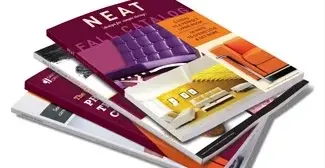 Stack of printed magazines and brochures