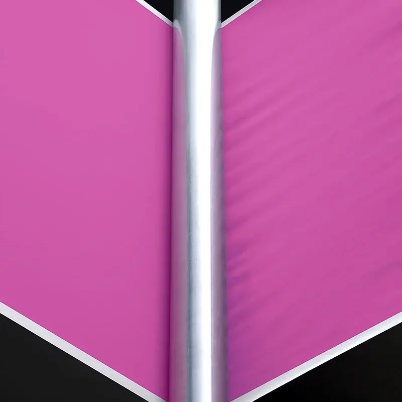 Close-up of a magenta printed sheet fold used to illustrate drying/cockling correction